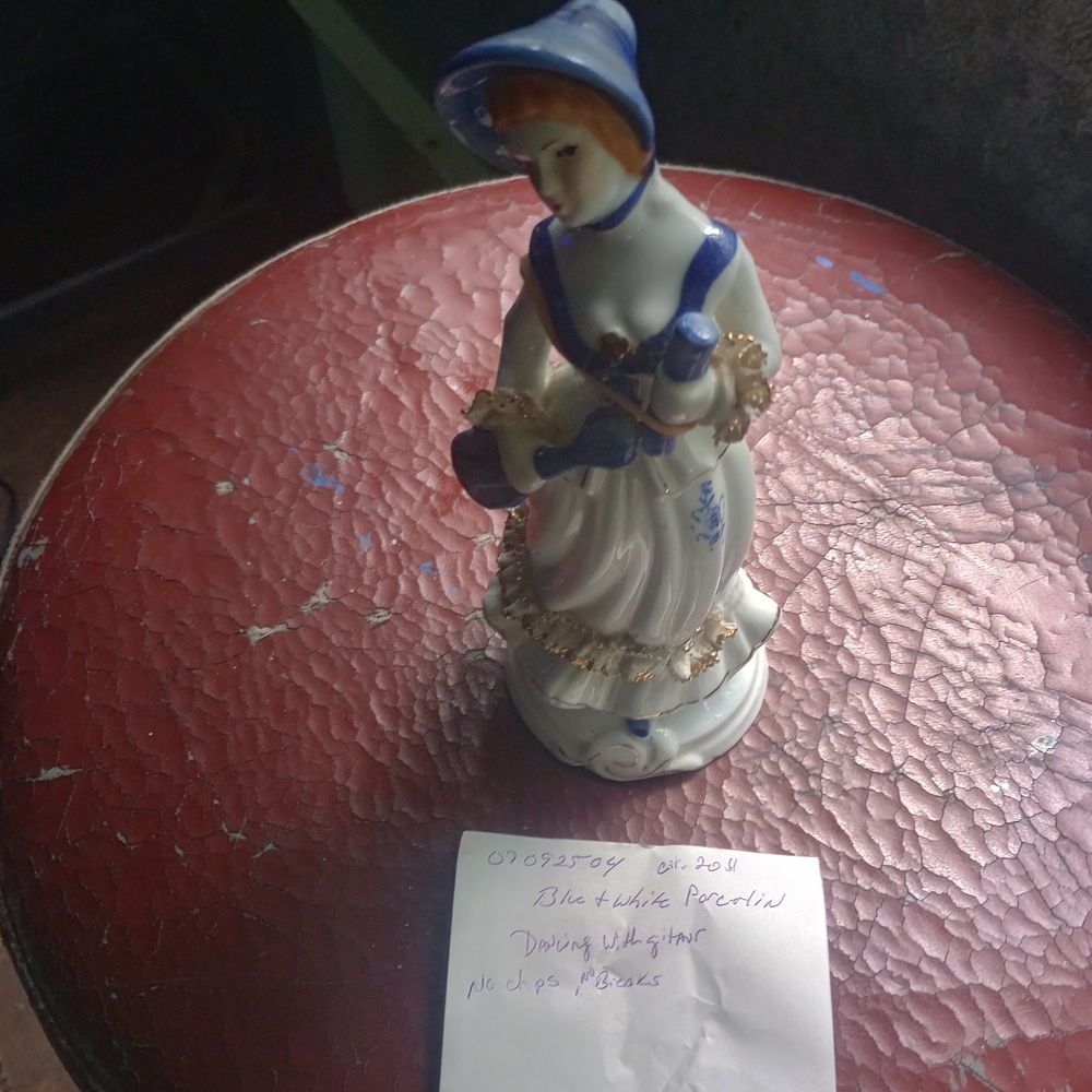 Avon Blue and White Porcelain Figurine